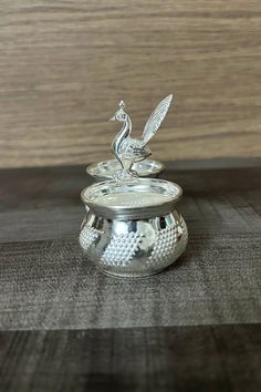 This Pure Silver Kumkum box is perfect for everyday use. Best for gifting or for personal use, use it on any occasion and have the spotlight. Eye-catching and unique accessories that will set you apart. Gift this piece to a loved one, and see their face light up with joy. It will bring prosperity and happiness to all homes Spiritual Pure Silver Kumkum Dimension: Weight: 46 Grams; Height: 7 cm; Width: 9 cm Kumkum Boxes Silver, Unique Accessories, Face Light, Accessories Unique, Box Design, Pure Silver, Silver Fashion, Light Up, Pure Products