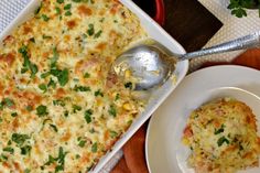 a casserole dish is shown with a spoon in it and on a plate