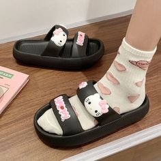 Step into summer with style and cuteness in our Sanrio Hello Kitty Slippers. These women's flat shoe sandals feature a double strap design that adds a trendy touch to any outfit. Perfect for sunny days and warm nights, they're the ultimate combination of comfort and adorable Hello Kitty charm. Cute Slip-on Slippers For Summer, Cute Spring Slip-on Slides, Cute Slip-on Slides For Spring, Cute Flat Non-slip Sandals, Cute Open Toe Synthetic Slippers, Cute Synthetic Slide Flip Flops, Cute Synthetic Flat Slides, Playful Open Toe Slides For Spring, Cute Flat Slides For Beach