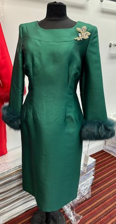 Lily and Taylor 4825 1 piece Novelty Dress Colors: Black, Green Multi, Hunter Green, Red, Royal Blue Sizes: 4, 6, 8, 10, 12, 14, 16, 18, 20, 22, 24 Matching Fur Headband Available A28 Matching Fur Shawl Available A62 Fur Headband, Dress Colors, Denim Maxi Dress, Fur Shawl, Bell Sleeve Dress, Hunter Green, African Print, Black Green, Bell Sleeves