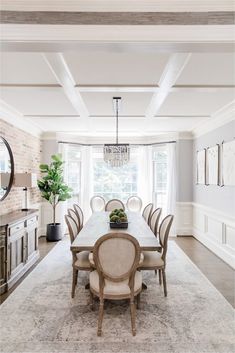 a large dining room table surrounded by chairs