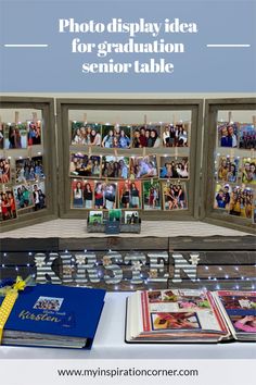 a table topped with pictures and books next to an open window filled with graduation photos