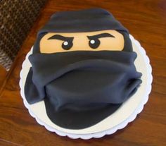 a cake with a ninja face on it