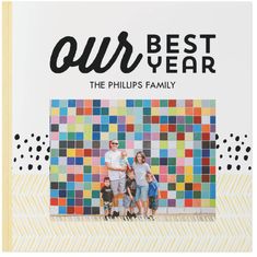 the cover of our best year book with an image of two adults and one child