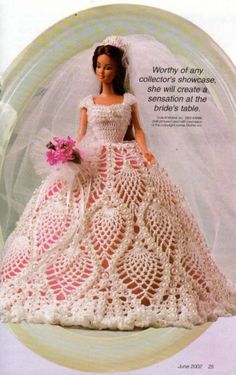 a crocheted doll in a wedding dress