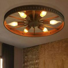 a round light fixture in the middle of a room