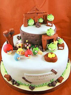 a white cake with angry birds on it