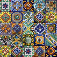 many different colored tiles are arranged together