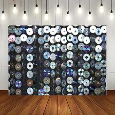 an image of a wall with many cds on it