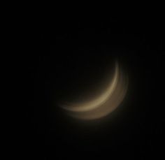 two crescents in the dark sky with no clouds