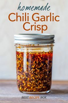 homemade chili garlic crisp in a jar with text overlay