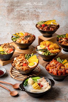 an assortment of food items displayed on wooden trays