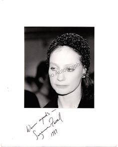 black and white photograph of a woman with braids on her head