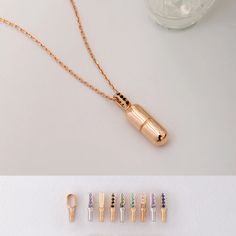 "14K 18K Solid Gold Cylinder Capsule Urn Pendant, Ash Holder Pill Necklace, Tube Vial Urn Cremation Necklace, Keepsake Pendant For Pet Ashes This dainty capsule urn necklace can hold your loved one's ashes, sand from a special place, or even small pieces of flower petals or hair. You can easily place the ashes, hair, or burial soil of your loved one or special pet inside this pendant by yourself. Caring For Your Cremation necklace: Though this cremation necklace opens with a threaded screw, we s Container Necklace, Pill Necklace, Ash Capsule Necklace, Urn Pendant Cremation Jewelry, Urn Necklaces For Ashes, Ash Pendant Cremation Jewelry, Ash Necklace Cremation Jewelry, Gold Urn Necklaces For Ashes, Gold Urn