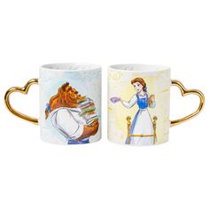 two mugs with disney characters on them, one has a bear and the other has a princess