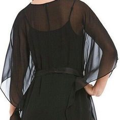 The Perfect Dress For This Season's Social Calendar Is The Epitome Of Flowy Ease And Elegance In A Loosely Structured, Fluttering Cut Of Sheer Stretch-Silk Wrapped With A Satin Ribbon Belt. - 38 1/2" Length Slips On Over Head - V-Neck - Three-Quarter Sleeves - Removable Tie Belt - Stretch-Silk Slip Lining - 91% Silk, 9% Spandex - Dry Clean - Imported - Individualist Care Machine Wash Black Silk Dress With Sheer Sleeves, Elegant Evening Kaftan For Spring, Chic Black V-neck Kaftan, Chic Silk V-neck Kaftan, Silk Open Front Dress, Black Cape Sleeve Dresses For Spring, Black V-neck Dress With Sheer Sleeves, Black Dresses With Cape Sleeves For Spring, Elegant Chiffon Kaftan For Spring