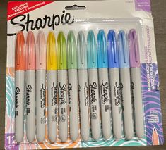 the sharpie markers are lined up in different colors