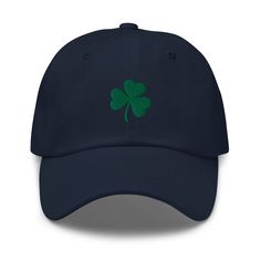 "Get ready to sham-rock St. Patty's Day in style with our Navy Blue Cotton Twill Adjustable Hat! 🍀  Made from premium cotton twill fabric, this hat offers both comfort and durability, ensuring it withstands all your festive celebrations.  Featuring a vibrant embroidered shamrock in classic green on the front, it adds the perfect touch of luck and charm to your ensemble.  Whether you're hitting the parade route or raising a pint at your favorite pub, this hat is sure to turn heads and spread Irish cheer wherever you go. Adjustable for the perfect fit, it's suitable for all shamrock enthusiasts, from leprechaun lovers to Guinness guzzlers! Grab yours today and let the festivities begin! Sláinte! 🎩💚 * 100% chino cotton twill * Unstructured, 6-panel, low-profile * 6 embroidered eyelets * 3 Embroidered Shamrock, Sham Rock, Irish Cheers, St Patricks Day Hat, Phillies Shirt, Irish Hat, St Pattys, Saint Patrick, Twill Fabric