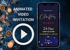 an animated video party with candles and christmas decorations on the table, next to a cell phone