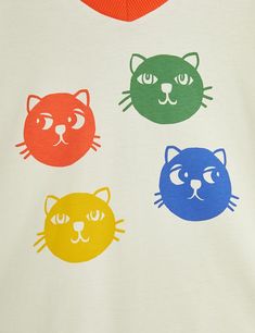 T-shirt in a relaxed fit made of 100 % GOTS-certified organic cotton. Design with a colourful cool cats print and a contrasting ribbed collar. Features• Relaxed fit • Colourful cool cats print• Ribbed collarMaterial• 100 % Organic Cotton• GOTS certifiedSince we are working with products that are mainly used by children, the control of chemical use is of the utmost importance to us. This garment is GOTS certified – the strictest certification for organic materials on the market today, which invol Cat Tee Shirts, Cat Tee, Tiny Cottons, Mini Rodini, Loose Fitting Tops, Sonny Angel, Organic Materials, Cat Colors, Animal Dolls