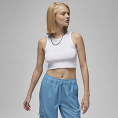 Add a little Jumpman to your favorite everyday crop top. Soft ribbed fabric stretches as you move, and the minimalistic design makes it a versatile wardrobe staple. Jordan Core, Nike Jordans Women, Jordan Women, Nike Crop Top, Jordans Women, Versatile Wardrobe, Women Lifestyle, T-shirts & Tank Tops, Minimalistic Design