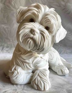 a white dog figurine sitting on top of a bed