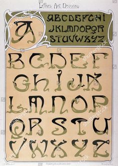 an old english alphabet with some type of writing on it's side and the upper letters