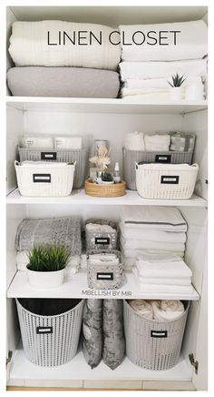 linen closet with baskets, towels and other items on shelves in the same color scheme