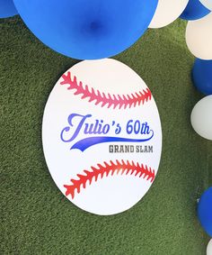 a baseball themed birthday party with balloons and confetti balls on the ground,