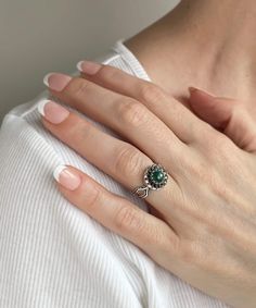 Enhance your feminine style with this exquisite lace dainty flower design 925 Sterling silver ring featuring a stunning malachite gemstone. Whether for daily use or special events like weddings, engagements, or proms, this elegant ring is the perfect accessory to elevate your outfit. Its intricate ornamentation and exceptional craftsmanship make it an ideal gift for holidays, birthdays, and other special occasions, including Christmas and Mother's Day. Crafted with the utmost attention to detail Elegant Turquoise Ring With Center Stone As A Gift, Elegant Flower Shaped Birthstone Rings, Elegant Flower Shape Birthstone Rings, Elegant Silver Flower Ring With Birthstone, Filigree Ring With Center Stone As Gift, Elegant Turquoise Ring With Halo Setting For Anniversary, Bohemian Green Wedding Rings, Turquoise Open Ring For Wedding, Elegant Sterling Silver Flower Ring With Birthstone