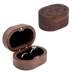 two wooden boxes with wedding rings in them