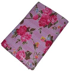 a pink flowered pocket square on a white background