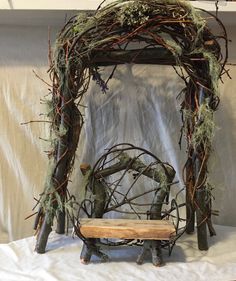 a bench made out of branches and twigs