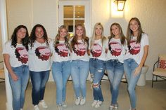 the girls are posing together in their t - shirts