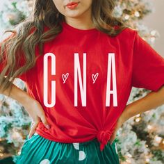 If you are a Certified Nursing Assistant or love your CNA then this shirt is for you! This holiday nurse shirt is perfect for any nurse aide or is the perfect graduation gift for a future nurse in the making. Get this cute shirt as a gift or for yourself to let everyone know you love what you do! ✦ Bella+Canvas 3001 ✦ Unisex Sizing ✦ Solid shirts are 100% cotton ✦ Heather shirts are cotton/polyester blend ✦ DTG (Direct To Garment) printing ✦ Mockups are used for demonstration purposes only. The design is printed directly on the garment and the final product may vary slightly in color and placement (due to handmade printing and differences in lighting on computer monitors/mobile screens). ~SIZING~ ✦ Unisex is a traditional semi-fitted men's t-shirt size but looks great on both men and women Tropical Xmas, Christmas Palm Tree, Married Shirt, Christmas Party Shirts, Cute Christmas Shirts, Funny Christmas Shirts, Family Christmas Shirts, Beach Shirt, Look Plus