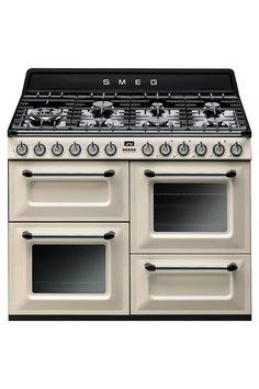 a white stove top oven with two burners on each side and one door open