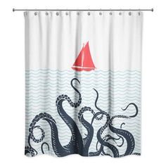 an octopus shower curtain with a sailboat in the ocean on it's side