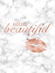 the words hello beautiful on marble with pink lips and gold foil lettering in rose gold