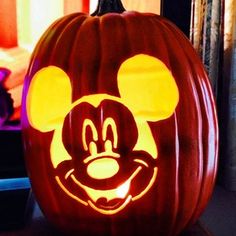 a mickey mouse pumpkin carved to look like it has been carved