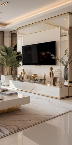 a living room filled with furniture and a large flat screen tv mounted on the wall