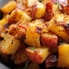 cooked potatoes with herbs and seasoning in a bowl