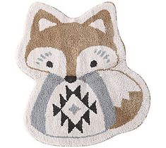 a small rug with a fox on it's face and an arrow in the middle