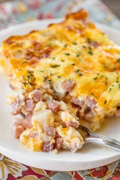 ham and potato breakfast casserole on a white plate