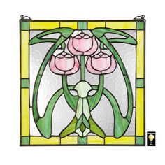 a stained glass window with pink flowers on it