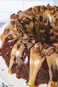 a chocolate bundt cake with caramel drizzle on top