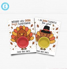 two thanksgiving greeting cards, one with a turkey on it and the other with a yellow cup