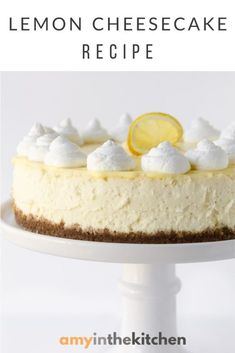 a lemon cheesecake on a white cake plate with the title overlay above it