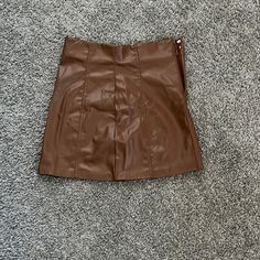 Never Worn Leather Skirt. Tags Still On Skirt. Chic Brown Skirt For Night Out, Brown Mini Skirt For Night Out, Brown Faux Leather Mini Skirt For Party, Brown Faux Leather Skirt For Party, High Waist Brown Skirt For Night Out, Party Faux Leather Brown Mini Skirt, Trendy Brown Mini Skirt For Night Out, Casual Brown Skirt For Party, Casual Brown Party Skirt