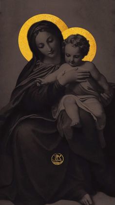 the virgin and child are depicted in this black and white photo with gold foil lettering