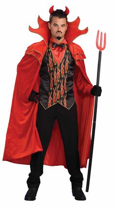 a man dressed in devil costume holding a pitchfork and wearing a red cape with horns